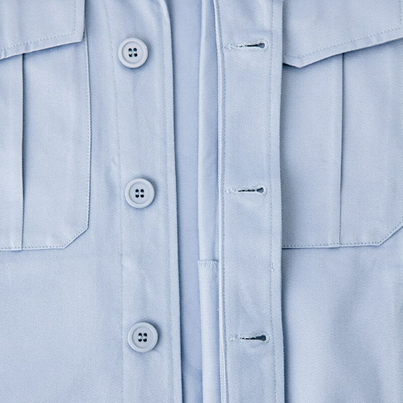 比翼ボタン仕様<br>作業時の引っ掛かりや、火の粉などからボタンを守ります。